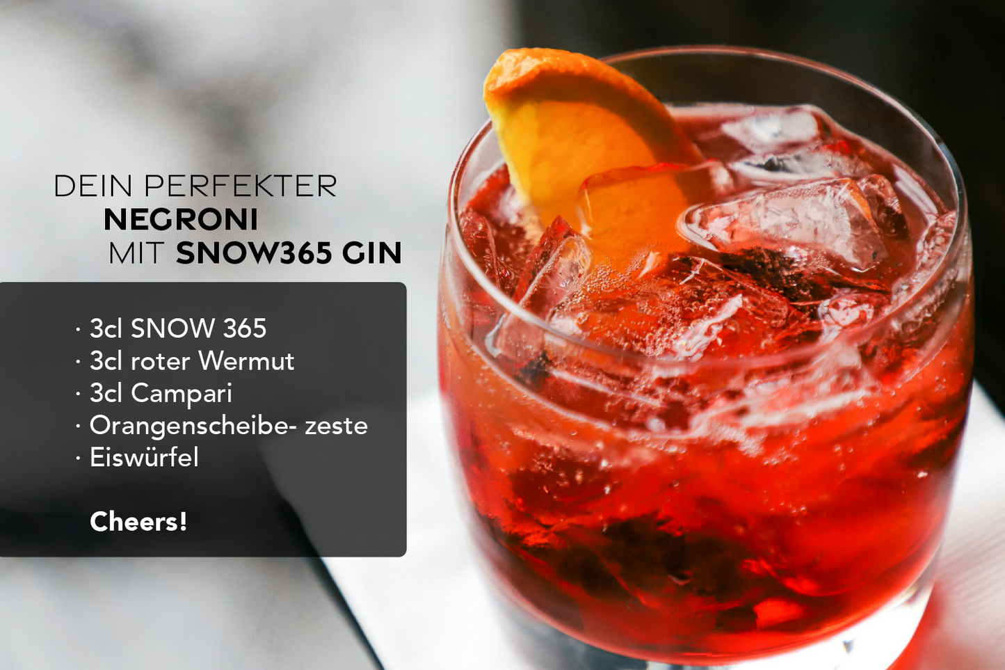 Premium Gin Negroni mit Orangenzeste – hochwertiger Drink mit SNOWO Gin im stilvollen Glas. Rezept der beste Negroni